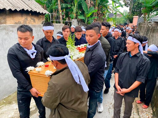 Vietnamese Village Holds Funeral for Trafficking Victims