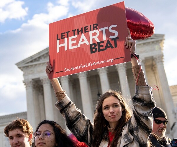 anti abortion protesters outside supreme court