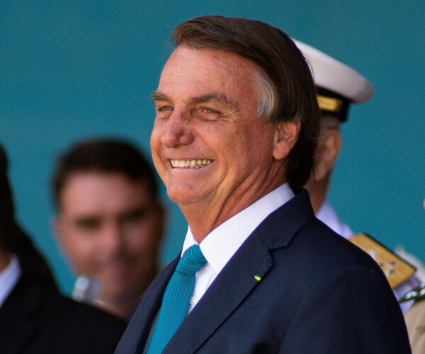 Jair Bolsonaro smiles