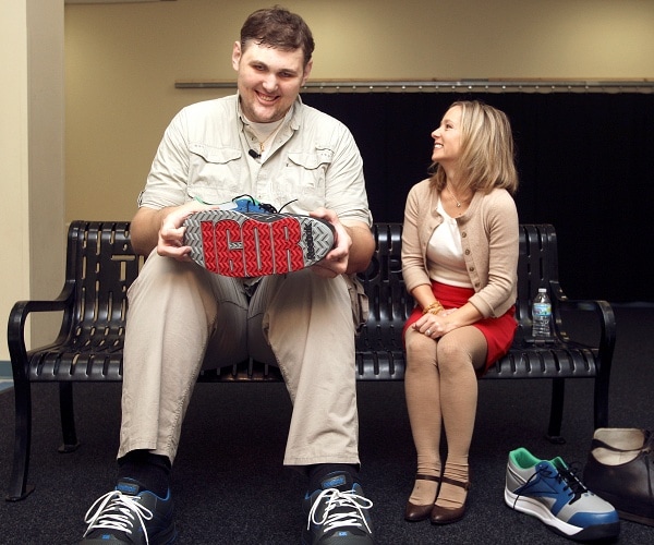 igor vovkovinskiy sits on bench with reporter