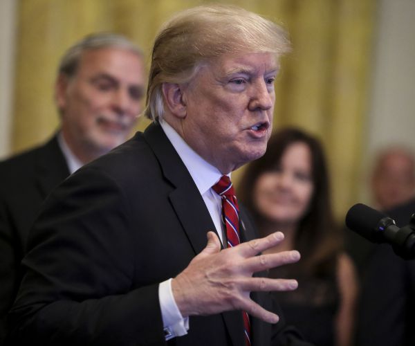 president donald speaks during a reception in the east room.