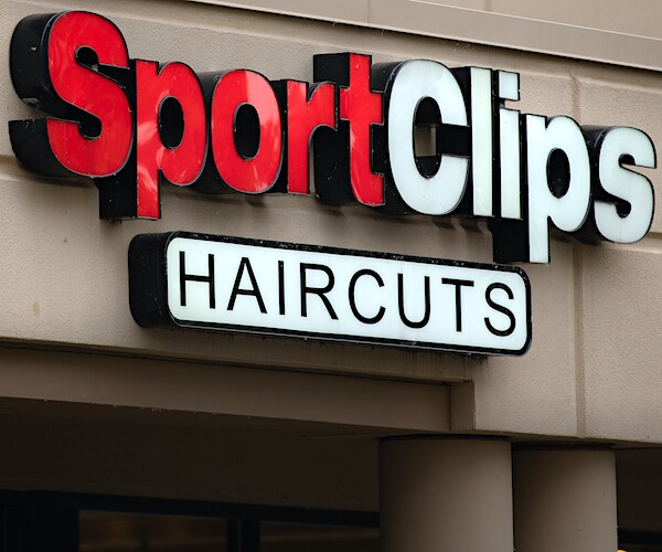 the sportclips sign above a hair cutting salon