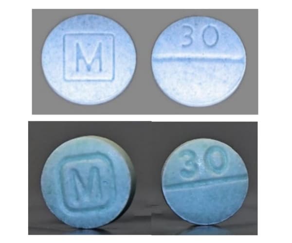 Examples of real (top) and fake (bottom) M-30 oxycodone pills