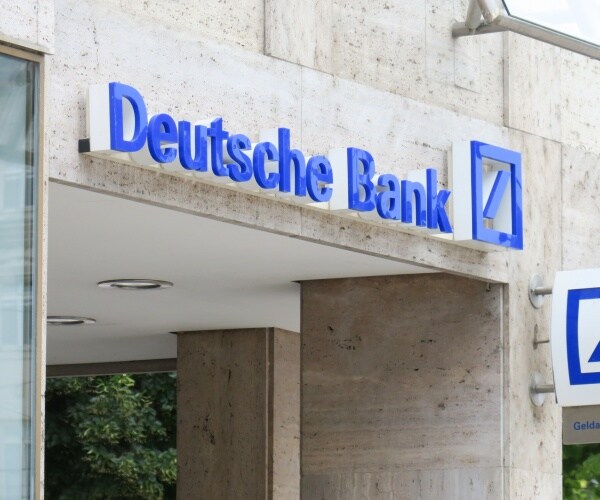 deutsche bank in blue letters with logo next to it