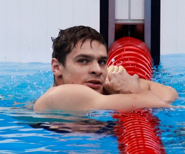 evgeny rylov in a swimming pool