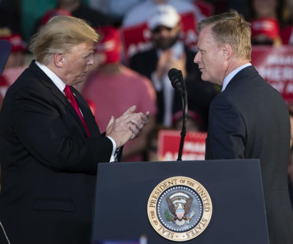 president donald trump welcomes fred keller on stage at a campaign rally