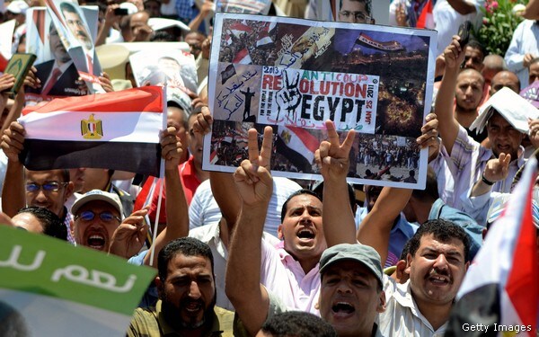 Egypt Orders Morsi's Detention for Ties to Hamas as Protests Begin