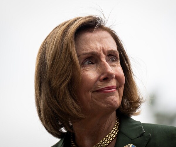nancy pelosi looks on