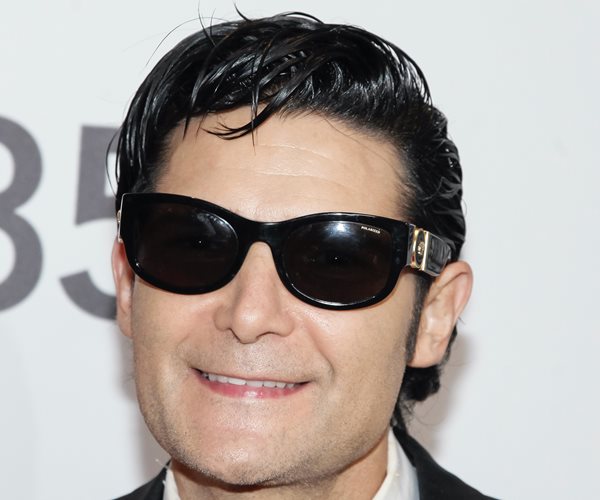 headshot of corey feldman wearing sunglasses