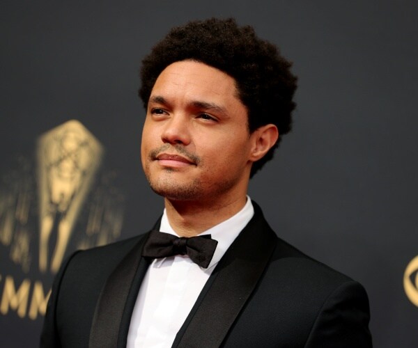 Trevor Noah wearing a suit