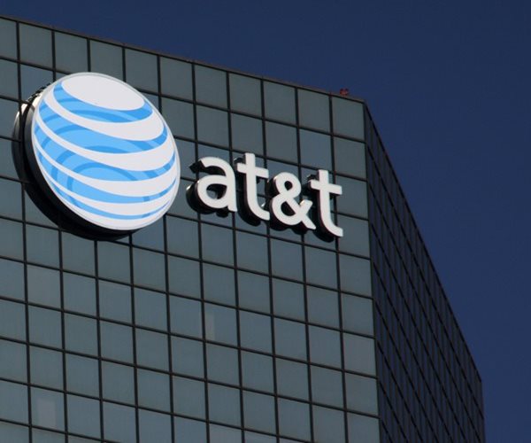AT&T Tops Estimates on Cost Cuts, Subscriber Adds