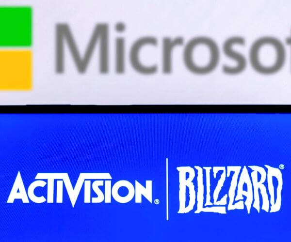 Microsoft Warns of Forex Hit, Cuts Forecast