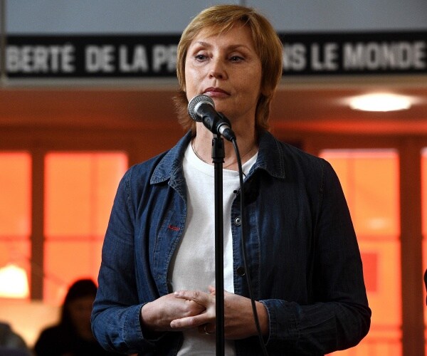 Zhanna Agalakova addresses media during a press conference