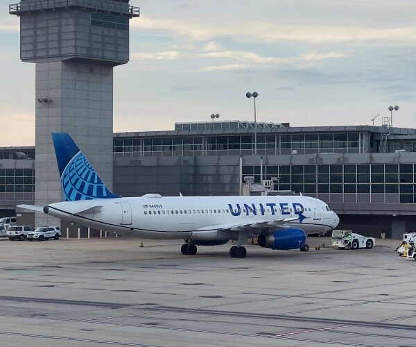 united plane sits at gate