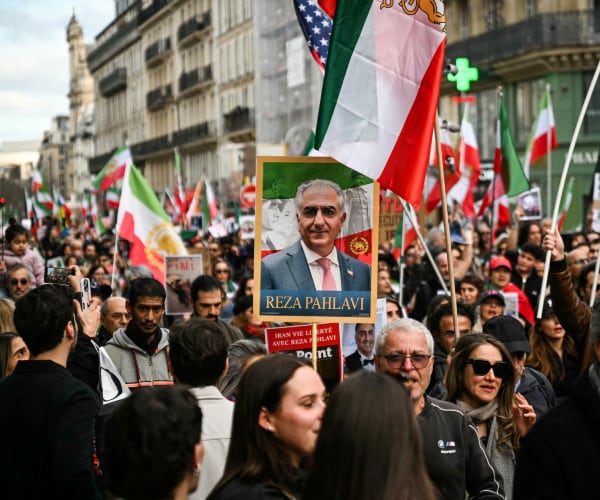 large city of overseas nation protests in support of united states invasion of a nation of the middle east 