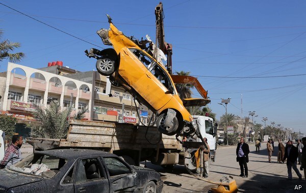 Explosions Rock Iraqi Capital, Killing at Least 34