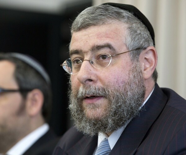 rabbi pinchas goldschmidt addresses a press conference 