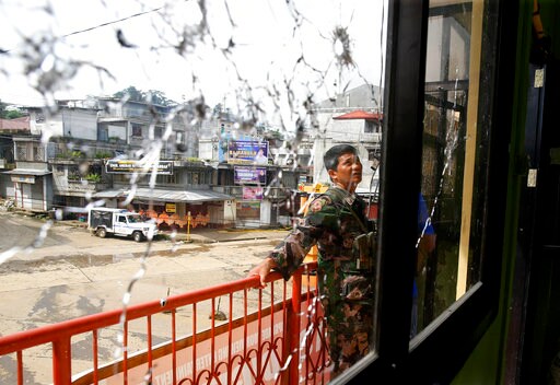 The Latest: Philippine Military Says Foreign Fighters Killed