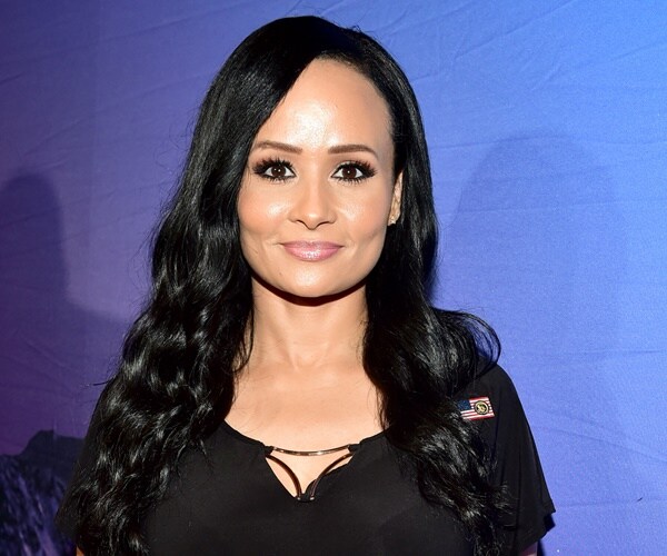 katrina pierson poses for a photo at an even