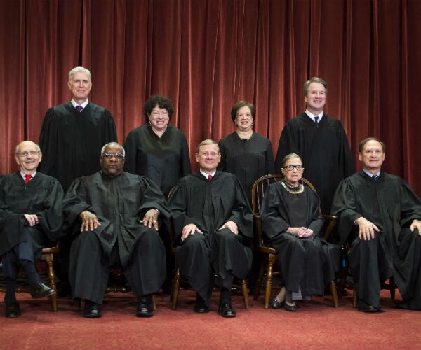 the supreme court justices are seen in their black robes