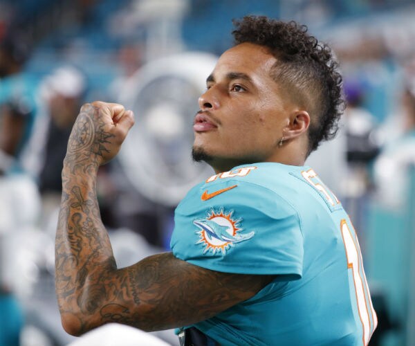 Kenny Stills reacts as he watches a quarterback sack during a preseason NFL game against the Atlanta Falcons