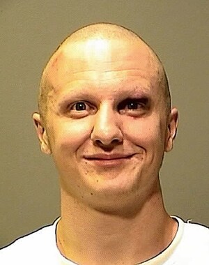 A Suspected Killer's Grin