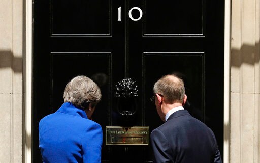 The Latest: UK Prime Minister Makes Cabinet Appointments