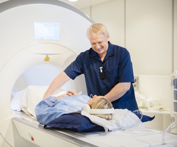 woman going into an mri