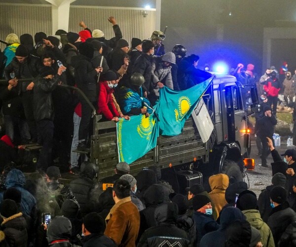 Protesters take part in a rally