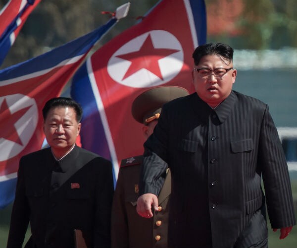 North Korean leader Kim Jong-Un with vice-chairman of the State Affairs Commission Choe Yong-Hae