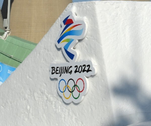 the beijing olympics logo and olympic rings