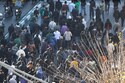 Volunteer in Iran's Revolutionary Guard Reportedly Killed During Widening Protests