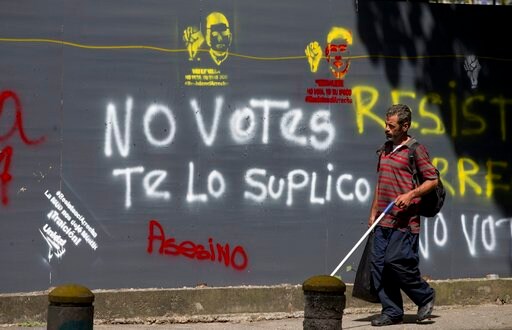 The Latest: Venezuela Leader Urges Vote to Show 'democracy'