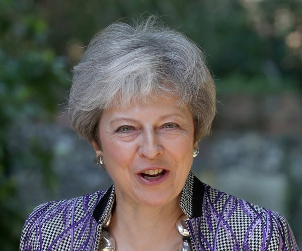 Britain's May Defies Trump: OKs Huawei 5G