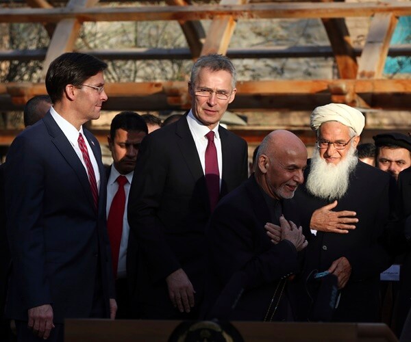 sec. mark esper with others to sign a peace deal with the taliban