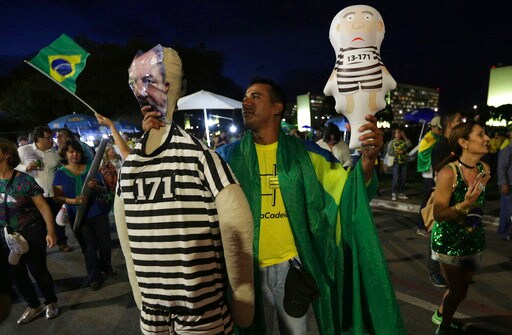 The Latest: Brazil Judge Issues Arrest Warrant for Da Silva
