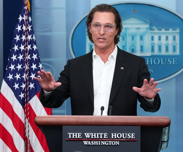 matthew mcconaughey gestures while speaking 