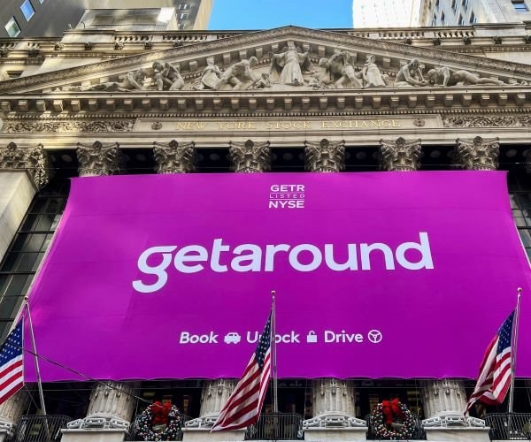 Wall St Falls as Inflation Slows but Remains Hot