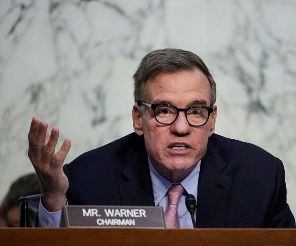 mark warner speaks in hearing