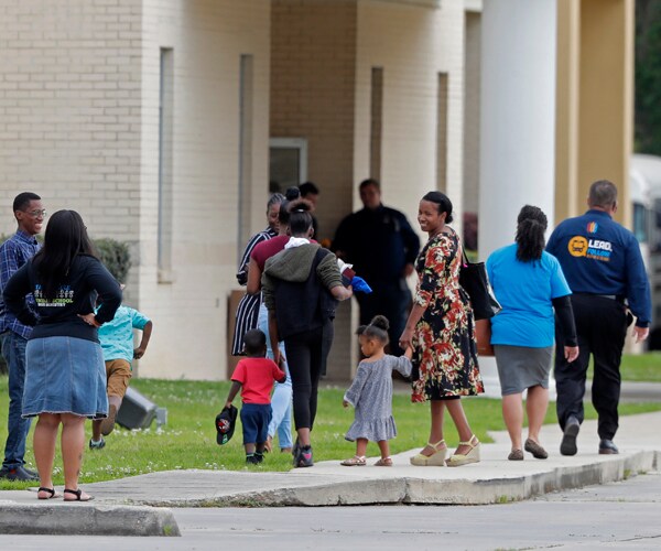 congregants arrive at the life tabernacle church in central, Louisiana, for services on march 29