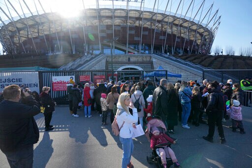 Priceless Paper: Refugees Get IDs for New Lives in Poland