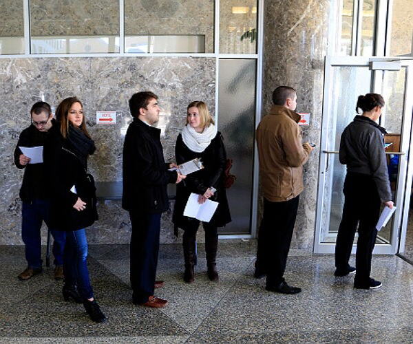 Exit Polls: Wis. Voters of Both Parties Say Trade Deals Hurt US Jobs