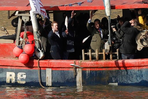 The Latest:  EU's Tusk Will Advise Backing Brexit Transition