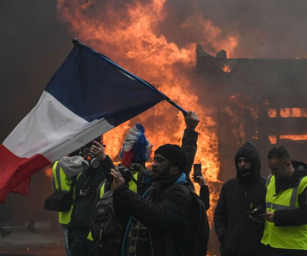 France Cleans up Champs-Elysees After Yellow Vest Rioting