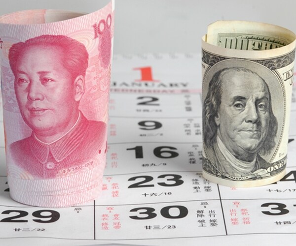 china and us currency note on date