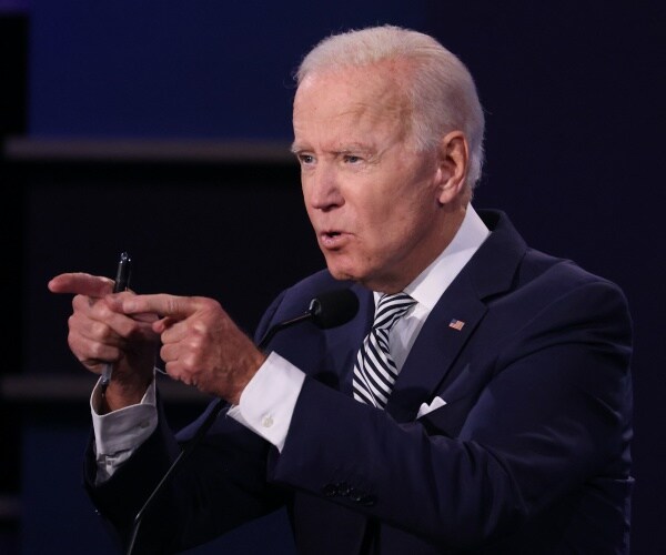joe biden speaks during a debate