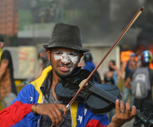 Venezuelan Protest Violence Flares, Violinist Injured