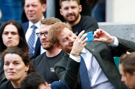 Prince Harry Joins Cheering Fans at Military Rugby Match