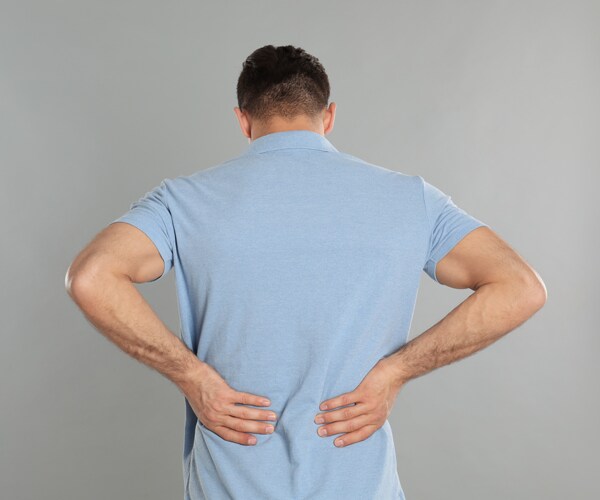a man suffering from lower back pain