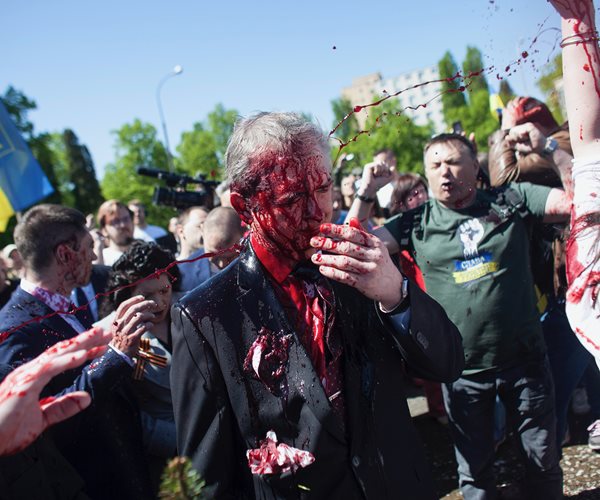 Sergey Andreev covered in red paint